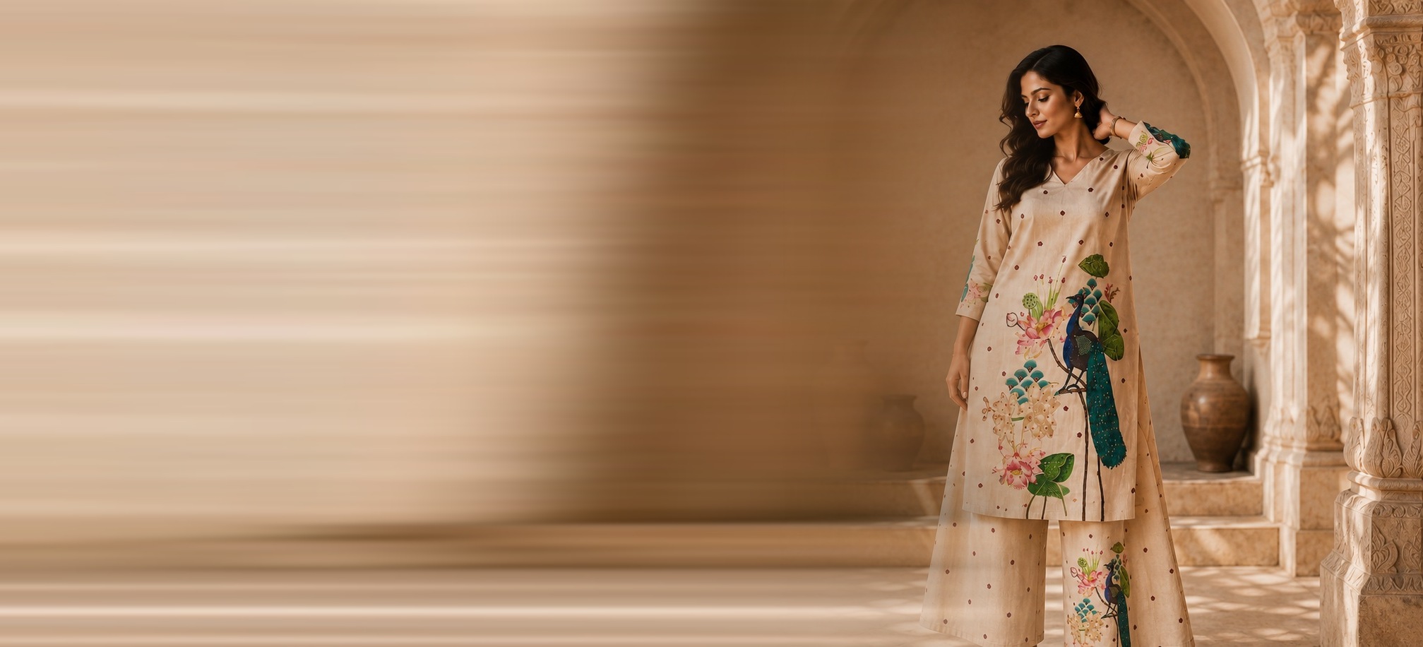 THIRTY3RD hand-painted peacock co-ord set in a courtyard arch